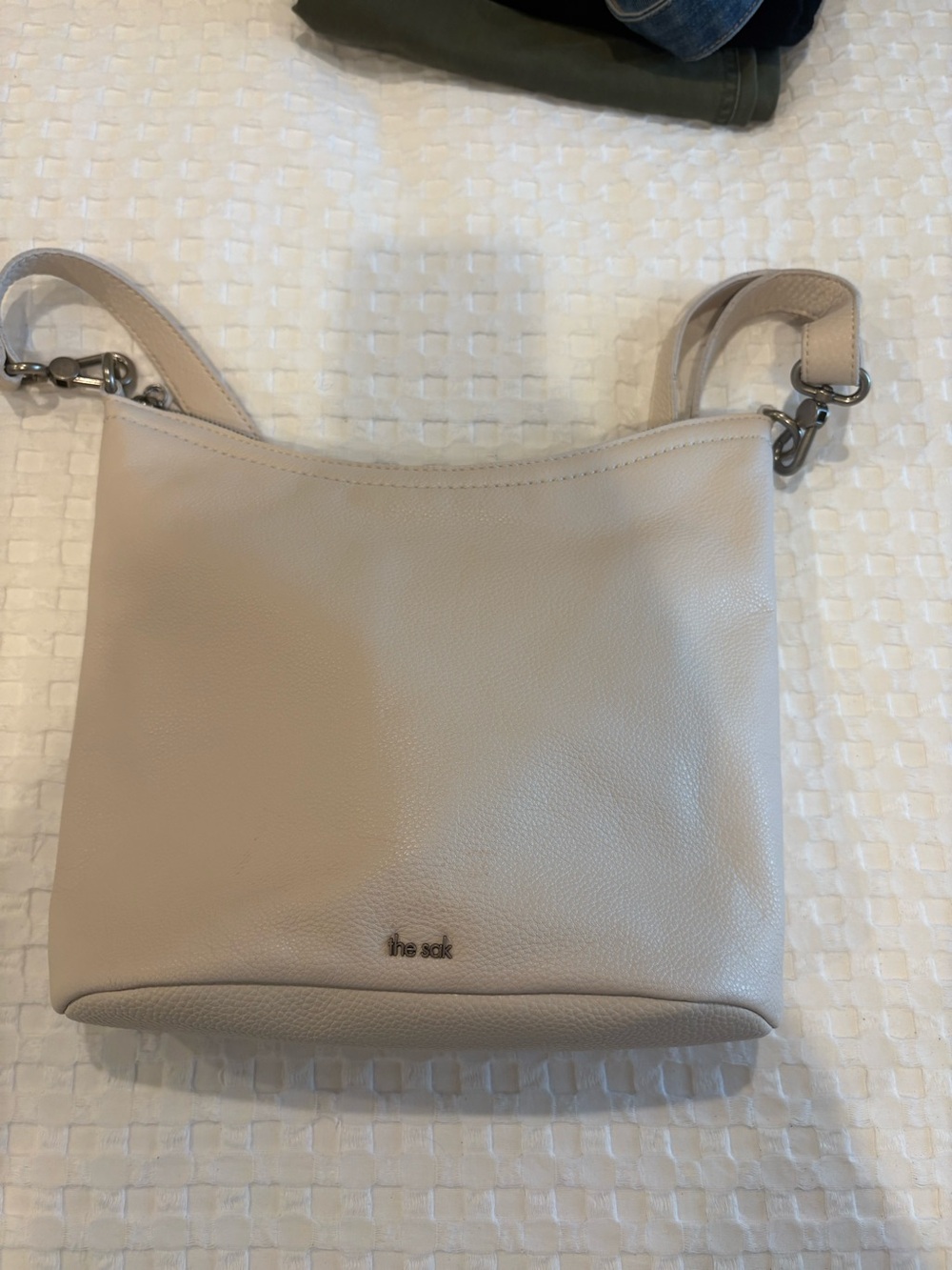 The Sak Pebbled Leather jasmine crossbody bucket bag